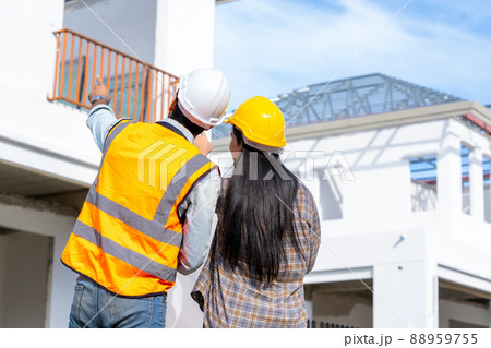 Engineer team work planning in construction site,Construction Contractors building a new home. 88959755