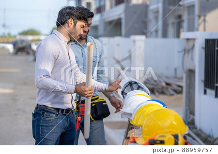 Engineers group consult construction on site building working at construction site. 88959757