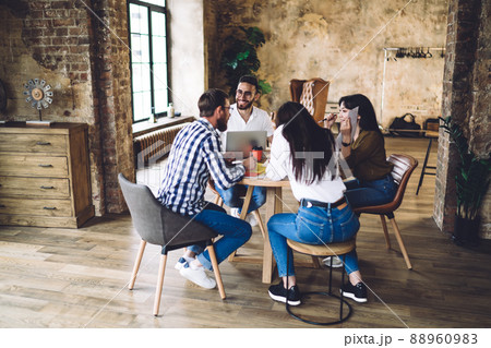 Skilled hipster guys 20s discussing freelance projecting and productive remote job 88960983