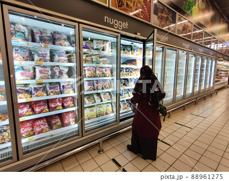 MELAKA, MALAYSIA - Frozen food that has been packed in commercial packs is stored and displayed in a large chiller. This chiller is able to maintain the freshness of the food. MELAKA, MALAYSIA - Frozen food that has been packed in commercial packs is stored and displayed in a large chiller. This chiller is able to maintain the freshness of the food. 88961275