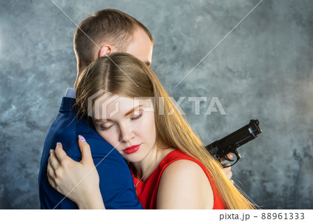 girl lies on shoulder of guy with his eyes closed 88961333