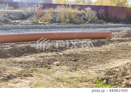 Preparation for laying the underground sewer pipe during reconstruction road Preparation for laying the underground sewer pipe during reconstruction road 88962400