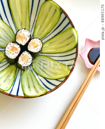 Sushi with salmon fish and cucumbers asian cuisine Sushi with salmon fish and cucumbers asian cuisine 88965170