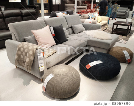 SELANGOR, MALAYSIA - JULY 4, 2022: Sofa furniture and chairs in the IKEA showroom in Malaysia. The furniture is well arranged to make it easy for customers to see and inspect it before buying. 88967390