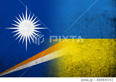 the Republic of the Marshall Islands National flag with National flag of Ukraine. Grunge background 88969543