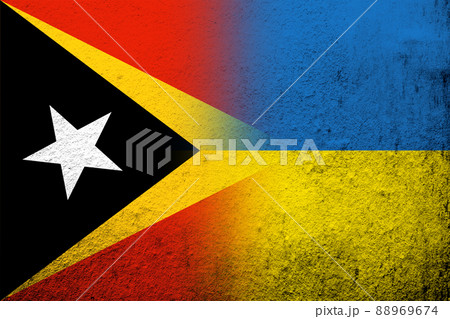 The Democratic Republic of Timor-Leste with National flag of Ukraine. Grunge background 88969674