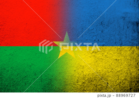 National flag of Burkina Faso with National flag of Ukraine. Grunge background 88969727
