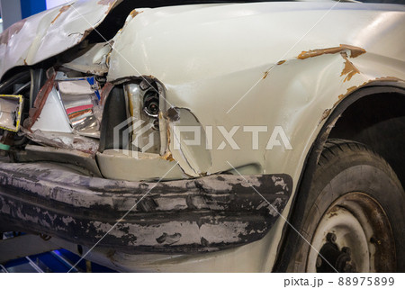 Close up shot of damaged car. Front damage 88975899