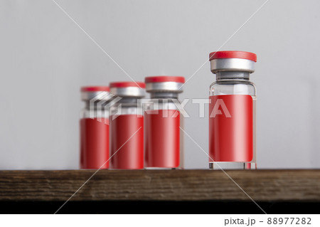 Medical vial for injection isolated on gray background mock-up series 88977282