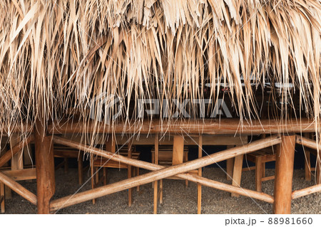 Wooden handrails and thatch, background texture Wooden handrails and thatch, background texture 88981660