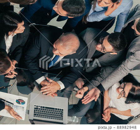 top view. business team applauding in the workplace. top view. business team applauding in the workplace. 88982948