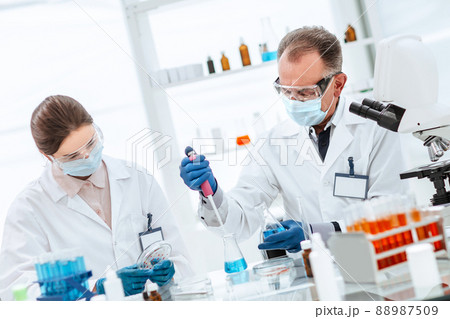 close up. scientists are testing a new vaccine. close up. scientists are testing a new vaccine. 88987509