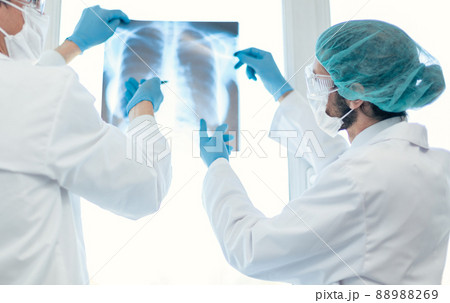 close up. medical colleagues discussing an x-ray of the lungs . 88988269