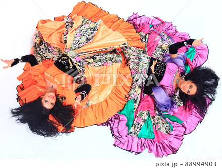 Gypsy dance group in national costumes performing folk dance. Gypsy dance group in national costumes performing folk dance. 88994903