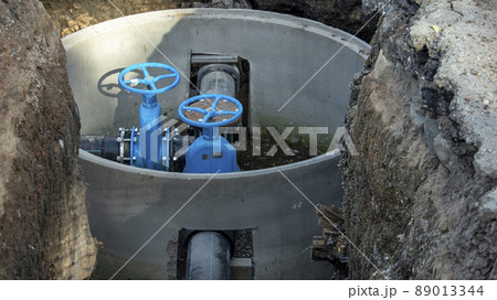 two blue valves for water supply in the new sewer well 89013344