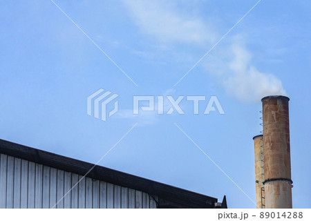 The chimney from the palm oil factory The chimney from the palm oil factory 89014288