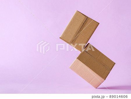 Cardboard boxes in levitation mail delivery and logistics concept. Cardboard boxes in levitation mail delivery and logistics concept. 89014606
