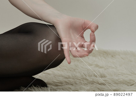 yoga pose closeup 89022497