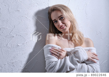 woman in bathrobe 89022646