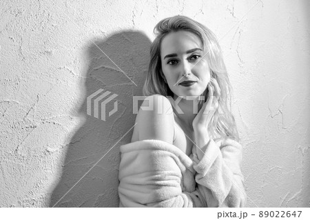 woman in bathrobe 89022647