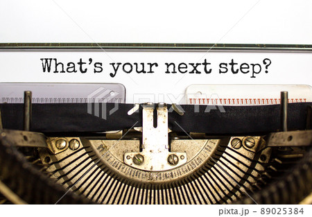 What is your next step symbol. Concept words What is your next step typed on retro typewriter. Beautiful white background. What is your next step business concept. Copy space. What is your next step symbol. Concept words What is your next step typed on retro typewriter. Beautiful white background. What is your next step business concept. Copy space. 89025384