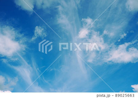 Blue Sky with Some Fluffy Clouds 89025663