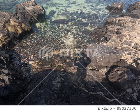 Incredible view from island to beach, small sandy beach on the island, coral reef, fujairah. High quality photo 89027330