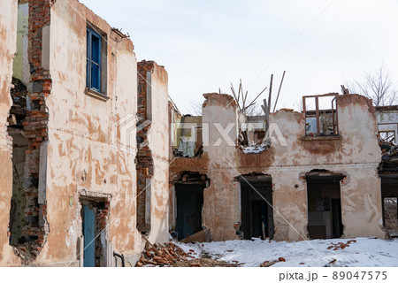 War ruins. Destroyed city after the bombing. Dead city. Bombed buildings. War ruins. Destroyed city after the bombing. Dead city. Bombed buildings. 89047575