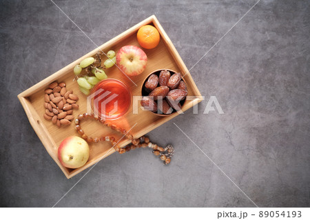 high angle view of iftar on plate on table during ramadan high angle view of iftar on plate on table during ramadan 89054193