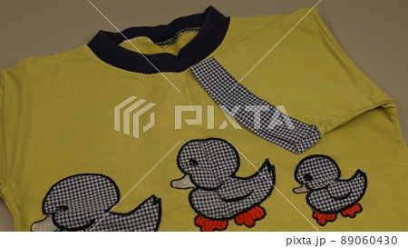 Children's colorful bright clothes. Things for small children. Knitted, fabric t-shirts, jackets and pants for babies Children's colorful bright clothes. Things for small children. Knitted, fabric t-shirts, jackets and pants for babies 89060430