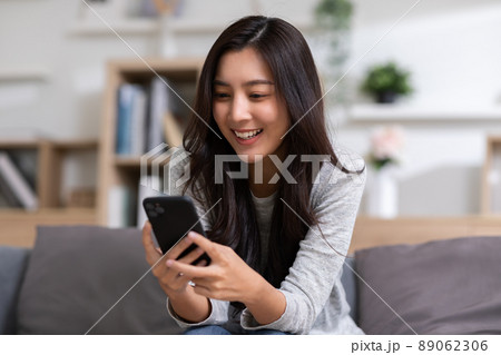 Happiness Entrepreneur beautiful business asian young woman wear casual use mobile phone for shopping online enjoy with social media and laptop at home.Small Business Startup.online banking Happiness Entrepreneur beautiful business asian young woman wear casual use mobile phone for shopping online enjoy with social media and laptop at home.Small Business Startup.online banking 89062306