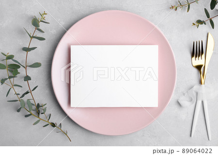Wedding stationery invitation card mockup 7x5 on grey background with eucalyptus, Menu card mockup with table setting 89064022
