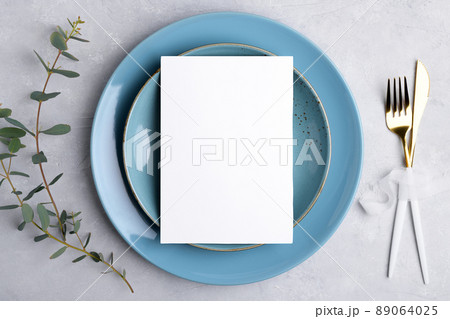 Wedding stationery invitation card mockup 5x7 on grey background with eucalyptus, Menu card mockup with table setting 89064025