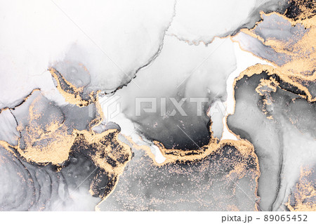 Black gold abstract background of marble liquid ink art painting on paper . Black gold abstract background of marble liquid ink art painting on paper . 89065452