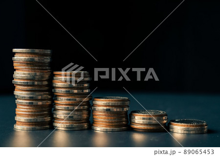 Pile of gold coins stack in finance treasury deposit bank account for saving Pile of gold coins stack in finance treasury deposit bank account for saving 89065453