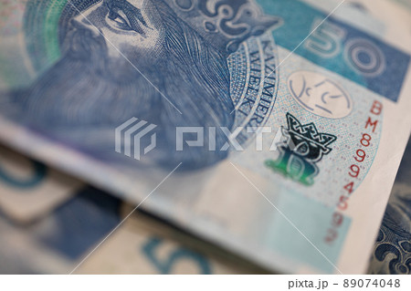 A paper banknote in very close-up. The official currency used in Poland. A paper banknote in very close-up. The official currency used in Poland. 89074048