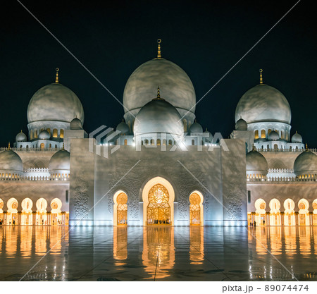 Abu Dhabi, United Arab Emirates - February 2022: Sheikh Zayed Grand Mosque interior in Abu Dhabi in the evening. Grand Mosque of Abu Dhabi. Abu Dhabi, United Arab Emirates - February 2022: Sheikh Zayed Grand Mosque interior in Abu Dhabi in the evening. Grand Mosque of Abu Dhabi. 89074474