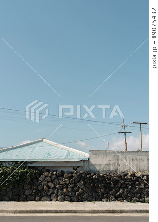 Jeju Olle Trail countryside village street in Jeju island, Korea 89075432