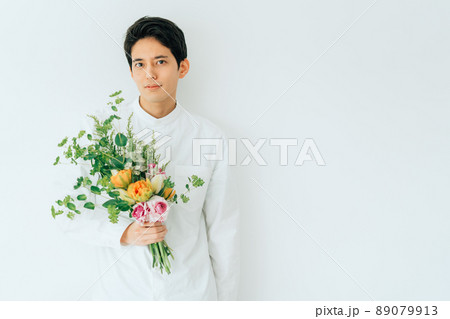 A Man With A Bouquet Stock Photo