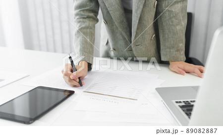 Confidence woman concept, Businesswoman is checking information to analyzing business strategy Confidence woman concept, Businesswoman is checking information to analyzing business strategy 89082887