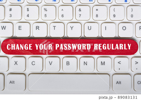 Change your password regularly text on wooden stick placed on laptop or notebook 89083131