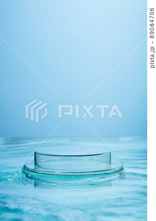 Front view of transparent podium and blank space in blue water background 89084706