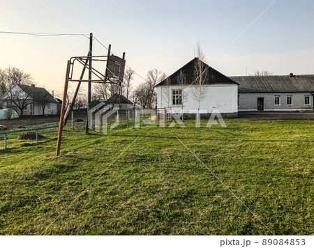 school building and old abandoned basketball court in the village of Velika Gorbasha, Zhytomyr 89084853