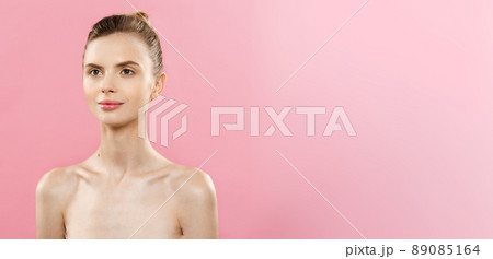Skin Care Concept - Charming young caucasian woman with perfect makeup photo composition of brunette girl. Isolated on pink background with Copy Space. 89085164