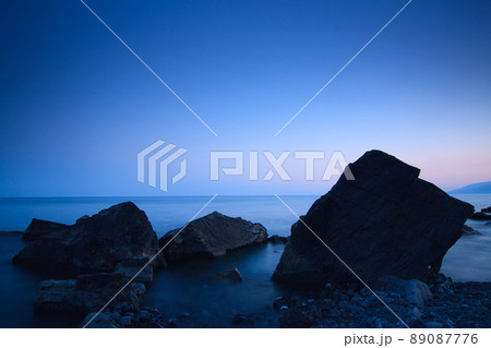Sea rocks at sunset. Breathtaking sunset view on the Black Sea coast, Crimea.  89087776