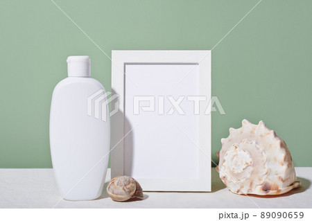 Trendy advertising with cosmetic mockup for promotion design. Beauty product. Summer seashells. Cosmetics packaging. Product display. Minimal style, copy space. 89090659
