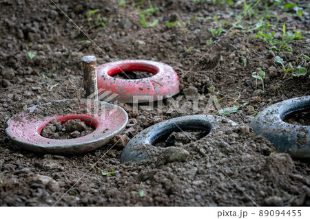 Quoits Resting Around the Peg 89094455