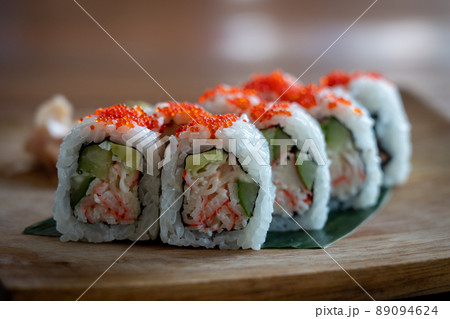 Maki Sushi on a Wooden Plate Maki Sushi on a Wooden Plate 89094624