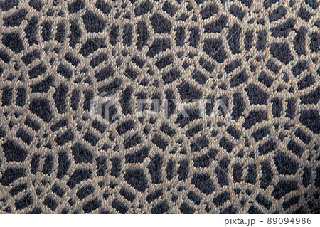 Abstract circular print background on cotton fabric in gray biege tone Abstract circular print background on cotton fabric in gray biege tone 89094986