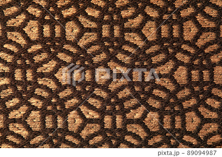 Abstract circular print background on cotton fabric in golden brown tone 89094987